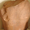 UC16614, fragment of a quartzite statue